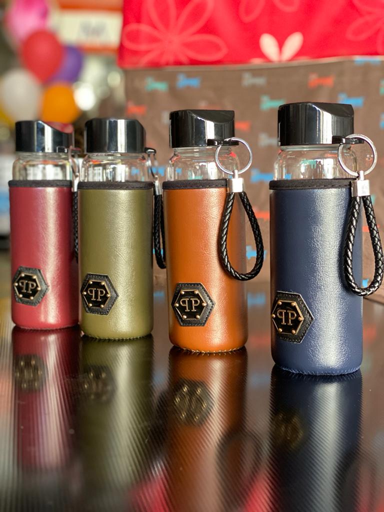 زمزمية زجاج تلبيسة جلد